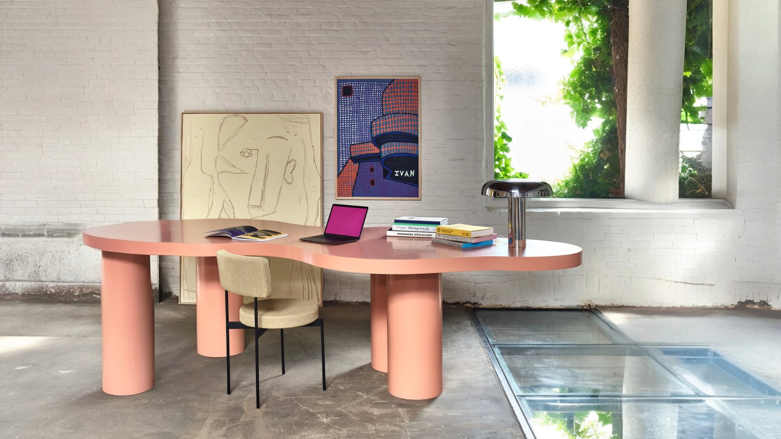 A chrome mushroom lamp in a cosy office