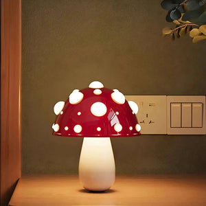 Mushroom-shaped lamp with a red cap and white spots.