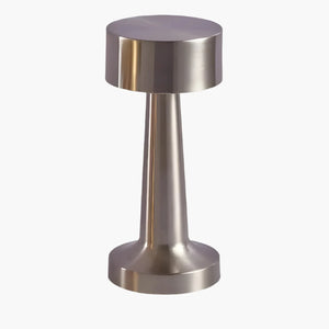 Metallic cylindrical object with a wider top and narrower base, resembling a modern lamp or decorative piece.