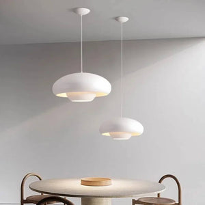 Two white dome-shaped pendant lights hanging from the ceiling.